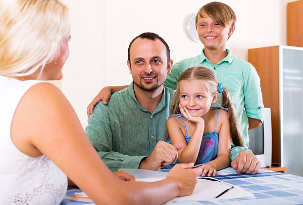 istock Young family and the agent 485478434