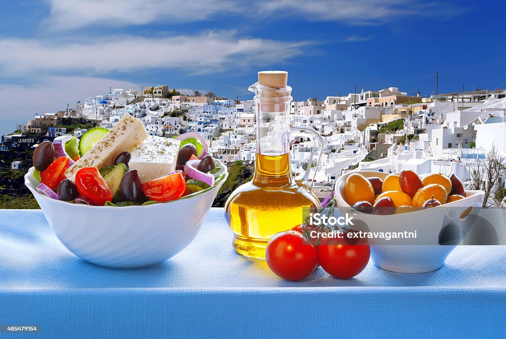 Greek salad in Santorini island, Greece Famous Greek salad in Santorini island, Greece Coastline Stock Photo