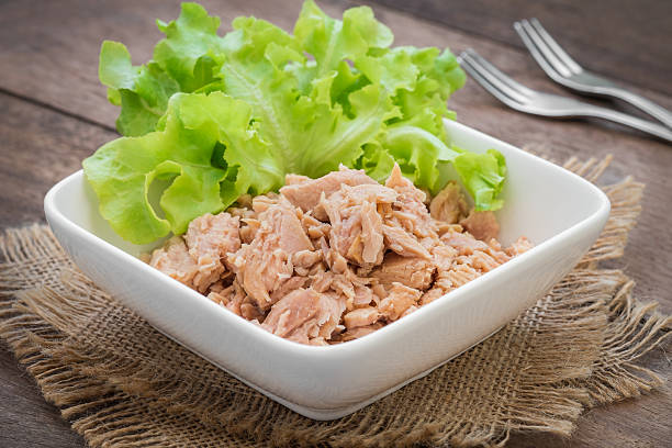 istock Canned tuna fish with vegetable in bowl 485484216