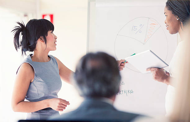 istock Businesswoman giving a presentation 485485194
