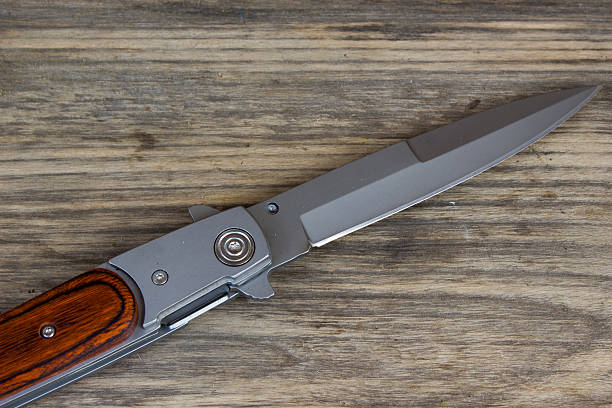 istock Knife Pocket on Wooden Table 485487234