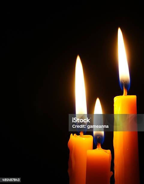 Closeup Of Burning Candle Stock Photo - Download Image Now - Candle, Candlelight, Catholicism