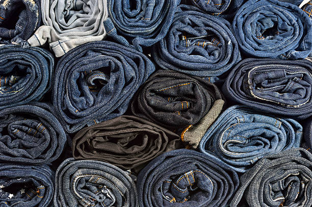 istock Lot of different blue jeans close-up 485487896