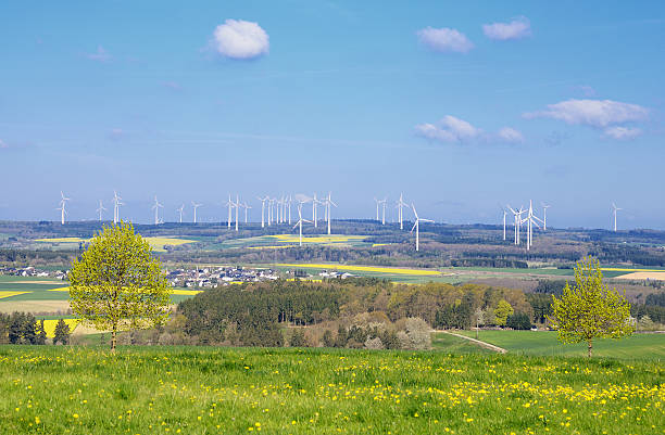 istock Wind turbine park and village in rolling landscape 485487905