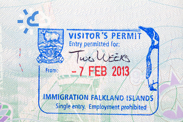 istock Falkland Islands Immigration Stamp in a British passport 485488904