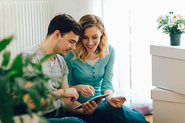 Young Couple Shopping Online WIth Tablet.
