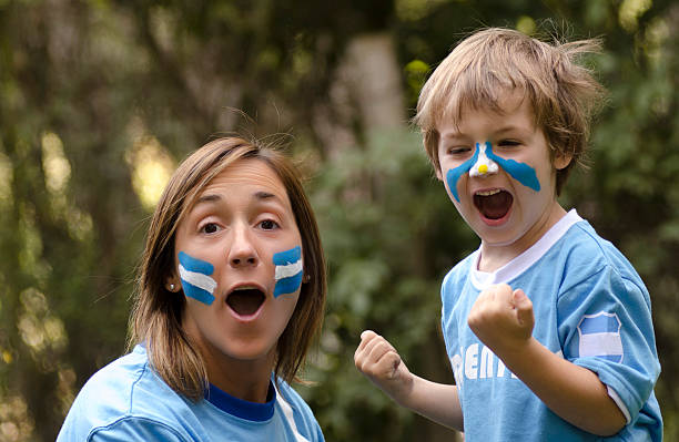 istock Mama and son screaming goal 485489361
