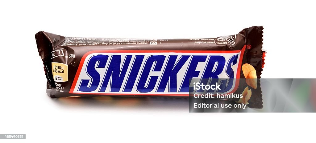 Snickers candy bar Prague, Czech Republic - April 15, 2014: Snickers chocolate candy bar on a white background Backgrounds Stock Photo