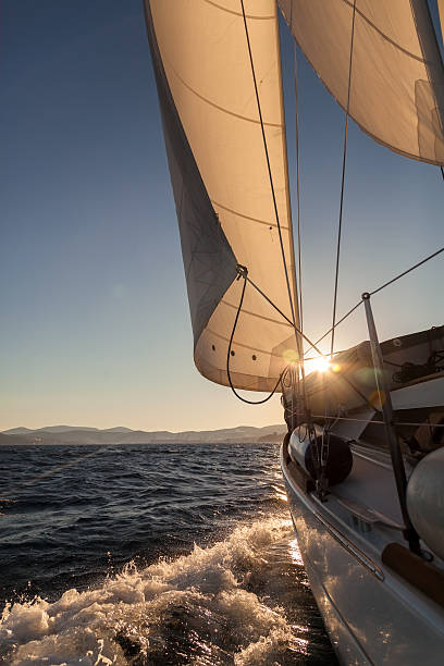 istock Sailboat crop at sunset ocean 485492157