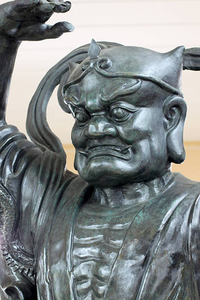 Black deity statues of Chinese religion in temple.