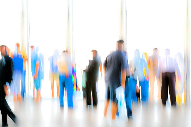 istock Large Group of Blurred, Unrecognizable People 485492642