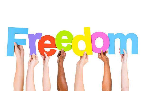 istock Multi-Ethnic Group of People Holding Letters To Form A Freedom 485492897