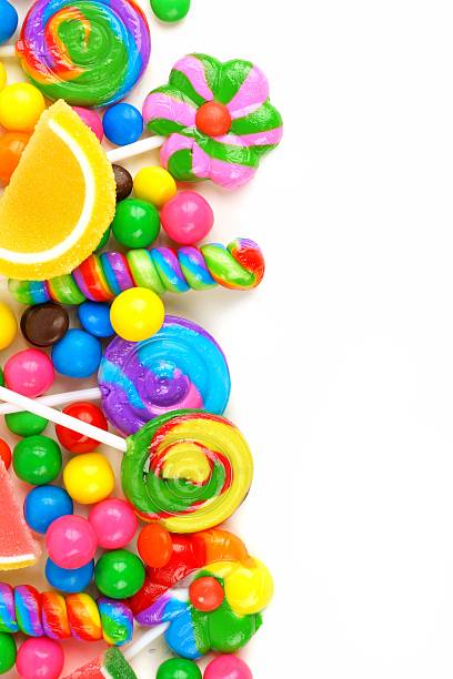 istock Side border of colorful candies over white 485493224
