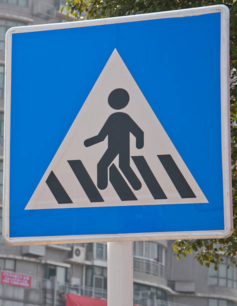 road zebra crossing sign stock photo