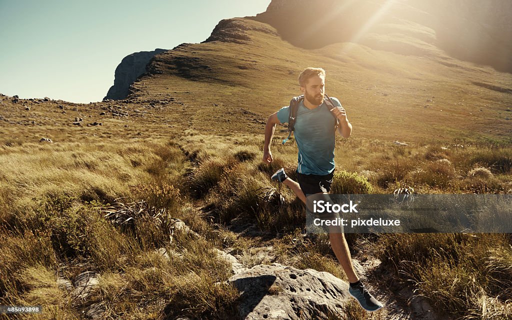 There's nothing like a run in solitude Shot of a man cross-country running in the morning http://195.154.178.81/DATA/i_collage/pu/shoots/804697.jpg 20-29 Years Stock Photo