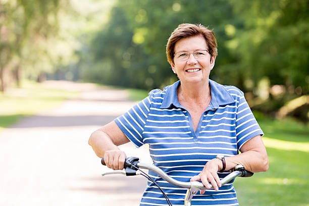istock Senior couple with bicycle having fun 485494874