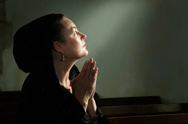 Photo of Lady at Prayer