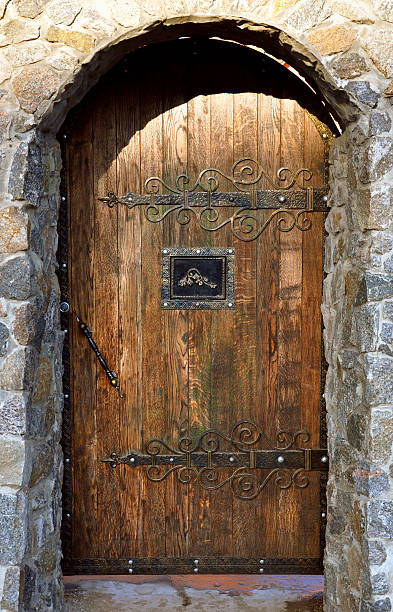 istock brick arch with wooden doors 485498740