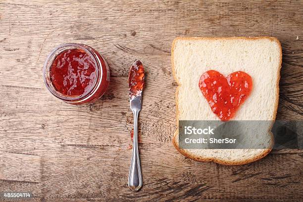 Slice Of Bread With Strawberry Jam In Heart Shape Stock Photo - Download Image Now - Bread, Preserves, Marmalade