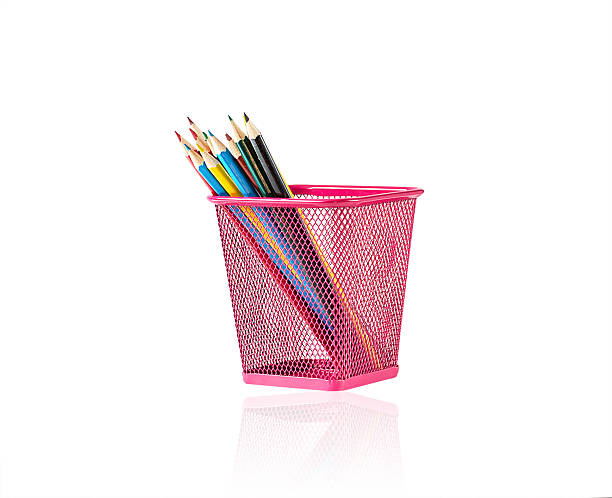 istock colour pencils in pink metal pot on a white 485504922