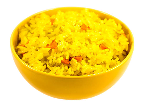 istock Boiled saffron rice with vegetables in yellow bowl 485505829