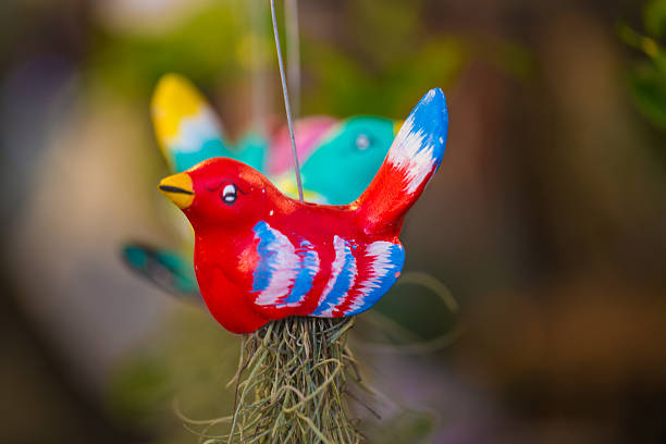 Wood crafted colorful parrot hanging