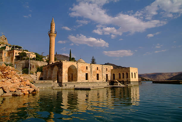 Mosque Mosque in Old Halfeti and its reflection halfeti stock pictures, royalty-free photos & images