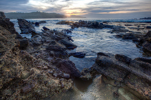 istock Sunrise in Sawarna Indonesia beach with corals 485510557