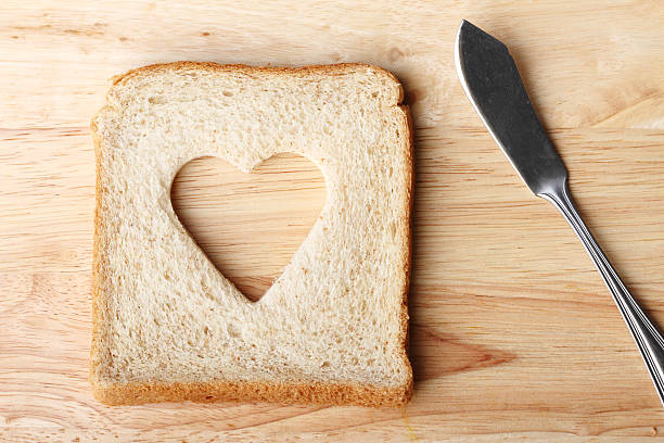 istock whole wheat bread, cut to heart shape 485512980
