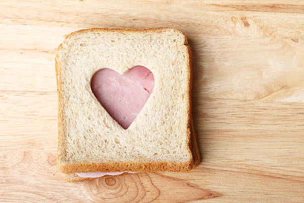 istock whole wheat sandwich, cut to heart shape 485512990