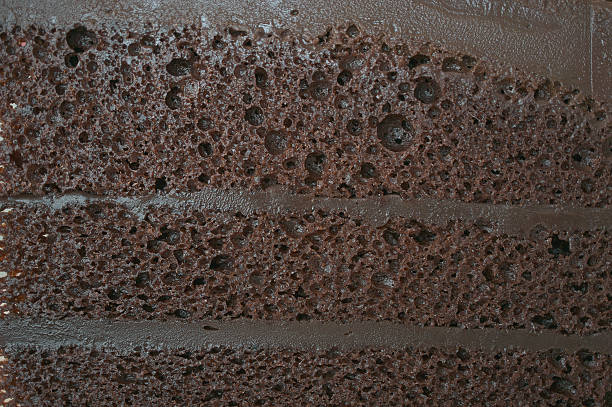 istock Close up layer of dark chocolate cake texture 485517602