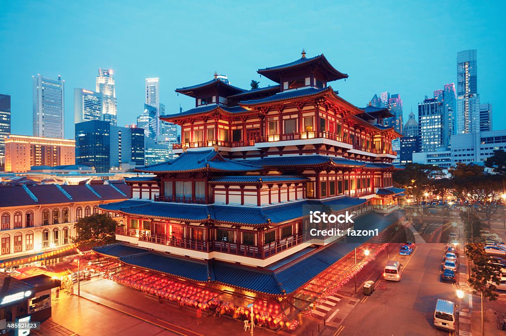Buddha Toothe Relic Temple, Singapore Buddha Toothe Relic Temple in Chinatown with Singapore`s business district in the background. Singapore Stock Photo