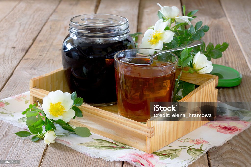 Home health rosehip syrup on a wooden table 2015 Stock Photo