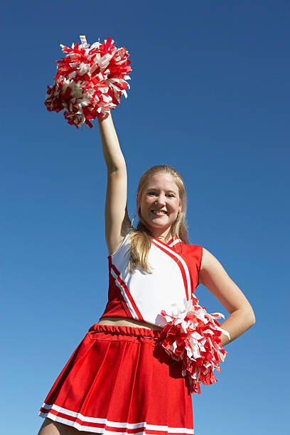 istock Cheerleader with Pom-poms 485524751