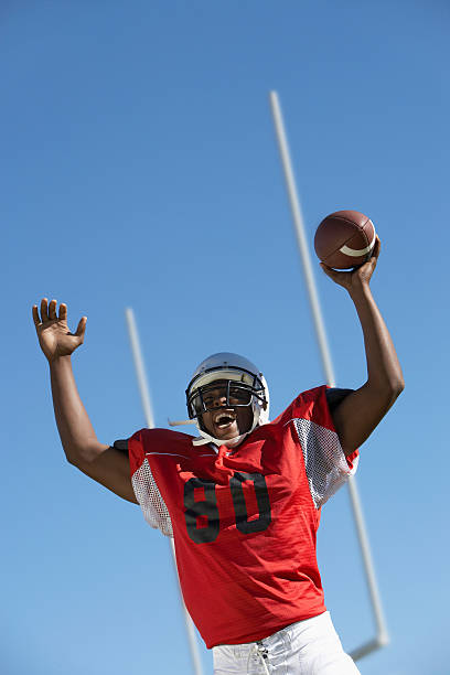 istock Football Player Celebrating Touchdown 485524781