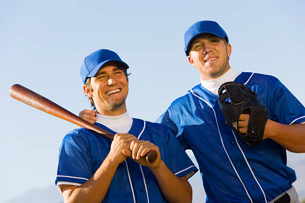 бейсбольная команда - baseball player baseball holding bat стоковые фото и изображения