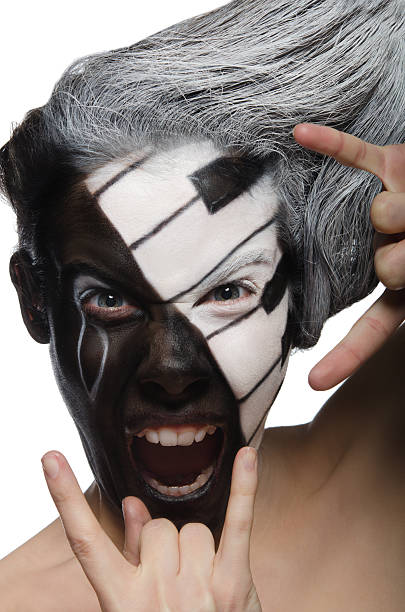 istock Vertical portrait with makeup and rock gesture 485526195