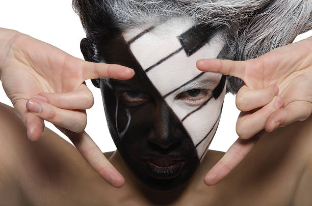 istock Horizontal portrait with makeup and rock gesture 485526201