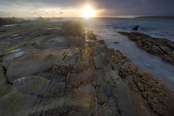 istock Sunset at Sawarna Beach Indonesia 485526291