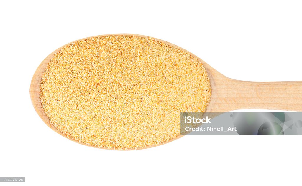 garlic Dry ground garlic on a wooden spoon. isolated on a white background 2015 Stock Photo