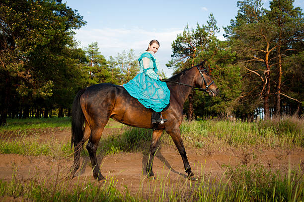 istock Horsewoman riding. 485531558