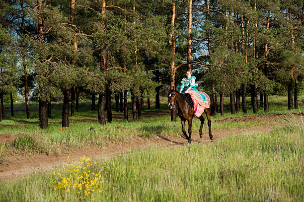 istock Horsewoman riding. 485531576