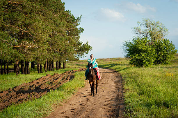 istock Horsewoman riding. 485531582