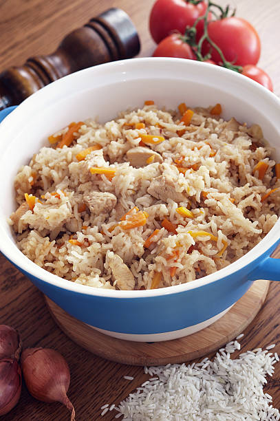 istock Rice cooked with vegetables and spices in ceramic form 485532218