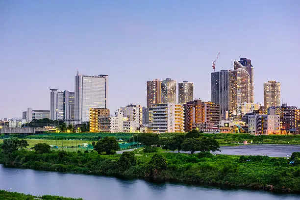 Kawasaki, Japan skyline at the Musashi-kosugi area on the Tamagawa River.