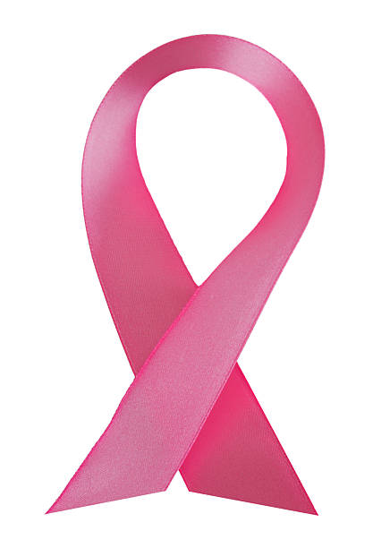 розовая лента рак молочной железы на белом фоне - breast cancer pink ribbon alertness стоковые фото и изображения