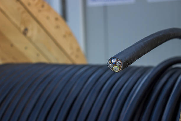 istock Roll of black industrial al cable with cross section  2 485538383