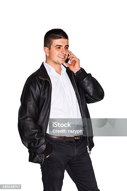 Young Man Talking Business On Cell Phone Stock Photo - Download Image Now - Adult, Beautiful People, Beauty