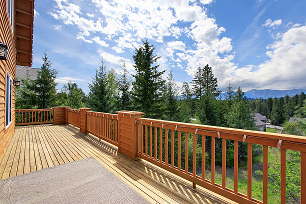 istock beautiful view of greenery from cabin style home. 485538814