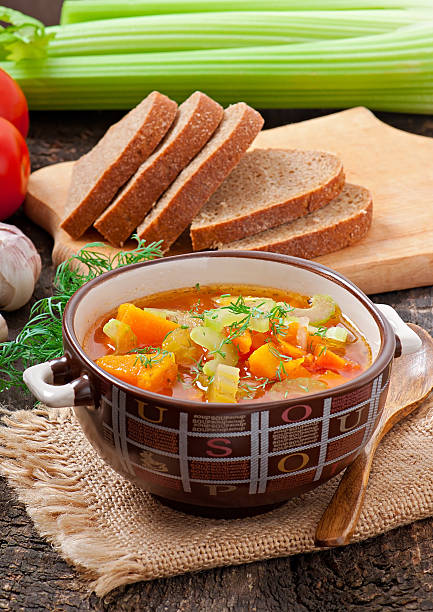 istock Vegetable soup on the old wooden background 485540189